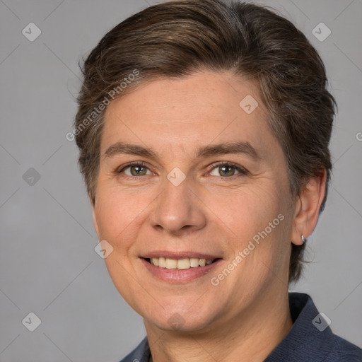 Joyful white adult female with medium  brown hair and brown eyes