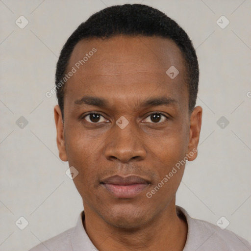 Neutral black young-adult male with short  black hair and brown eyes