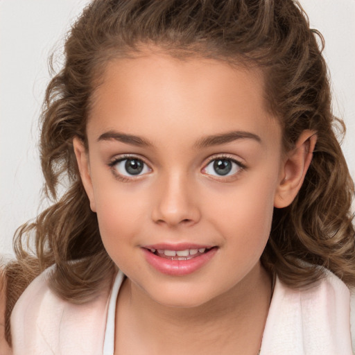 Joyful white child female with medium  brown hair and brown eyes