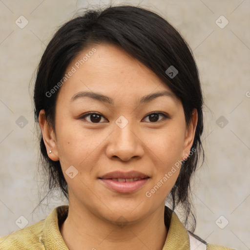 Joyful asian young-adult female with medium  brown hair and brown eyes