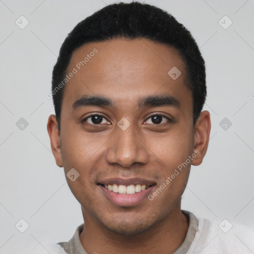 Joyful latino young-adult male with short  black hair and brown eyes