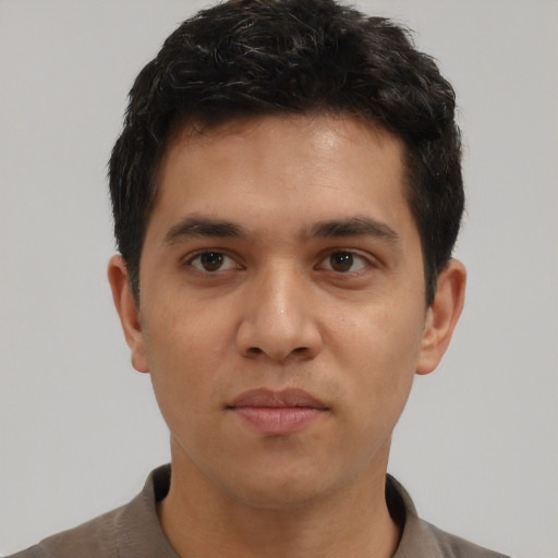 Neutral white young-adult male with short  black hair and brown eyes