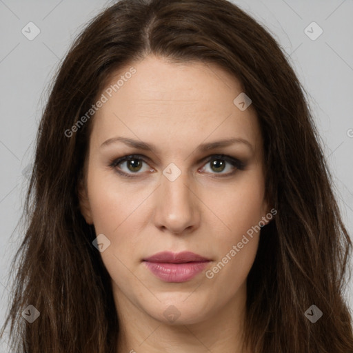 Joyful white young-adult female with long  brown hair and green eyes