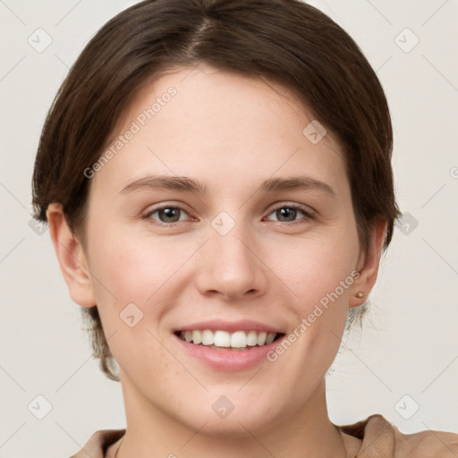 Joyful white young-adult female with short  brown hair and brown eyes