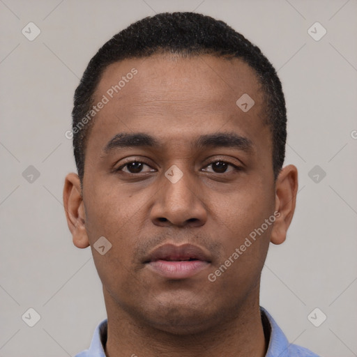Neutral latino young-adult male with short  black hair and brown eyes