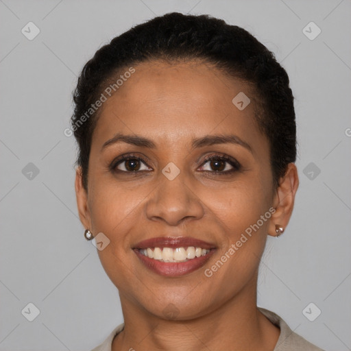 Joyful latino young-adult female with short  brown hair and brown eyes