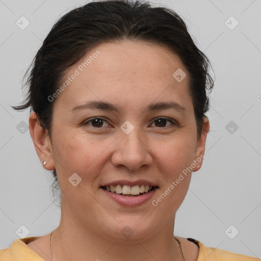 Joyful white adult female with short  brown hair and brown eyes