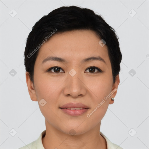 Joyful asian young-adult female with short  black hair and brown eyes