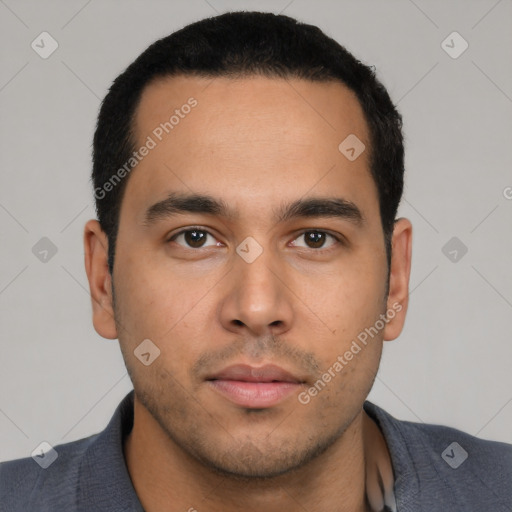 Neutral latino young-adult male with short  black hair and brown eyes