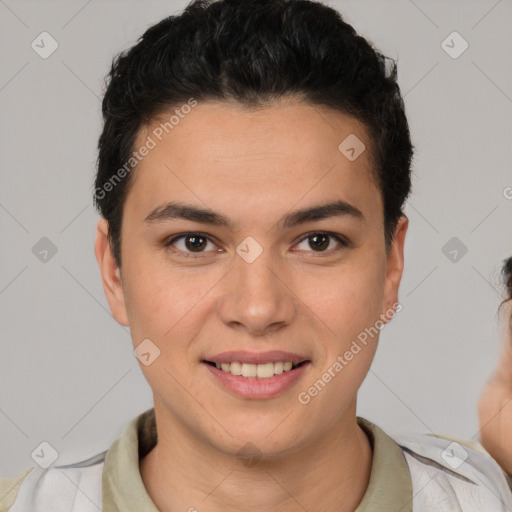 Joyful latino young-adult male with short  brown hair and brown eyes