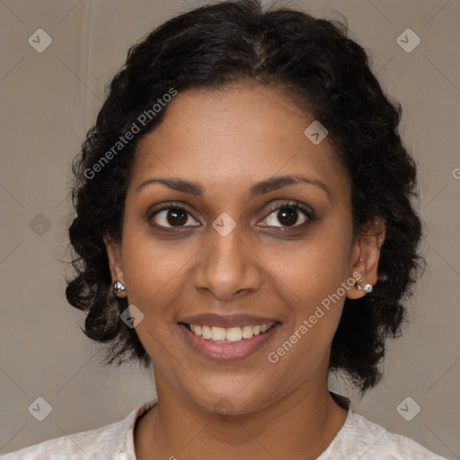 Joyful black young-adult female with medium  brown hair and brown eyes