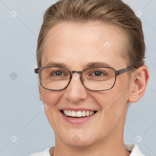 Joyful white adult female with short  brown hair and brown eyes