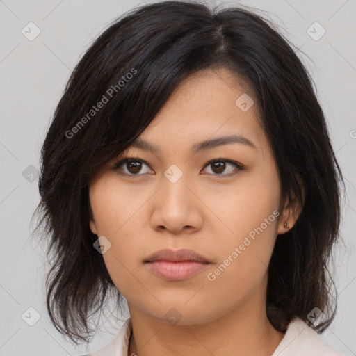 Neutral asian young-adult female with medium  brown hair and brown eyes