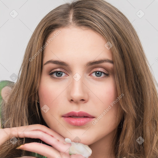 Neutral white young-adult female with long  brown hair and brown eyes