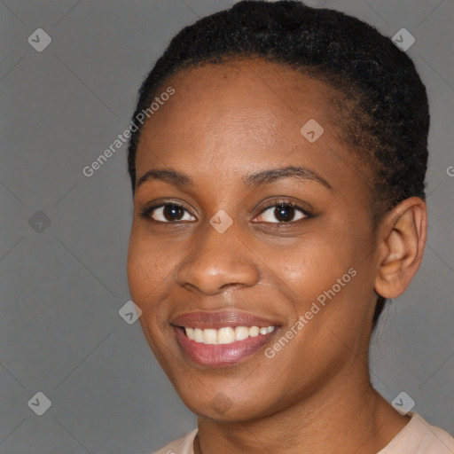 Joyful black young-adult female with short  brown hair and brown eyes