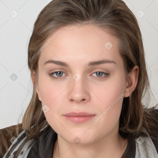 Neutral white young-adult female with long  brown hair and brown eyes