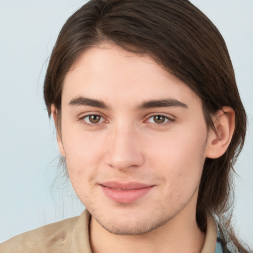 Joyful white young-adult male with medium  brown hair and brown eyes