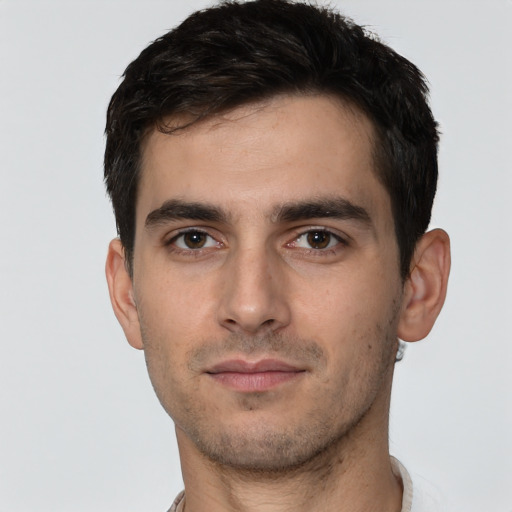 Neutral white young-adult male with short  black hair and brown eyes