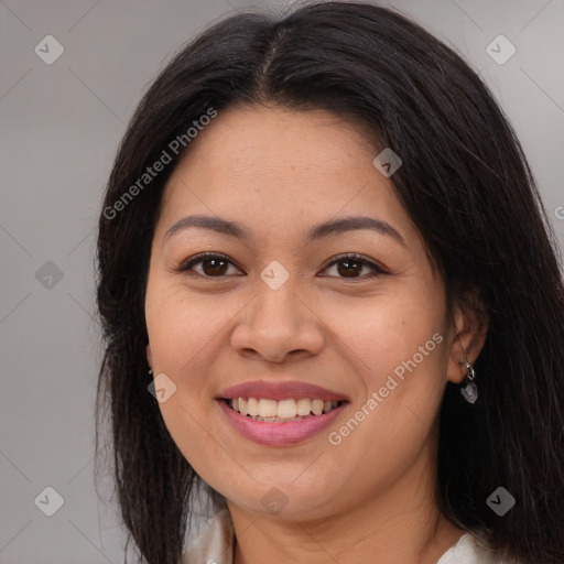 Joyful asian young-adult female with long  brown hair and brown eyes