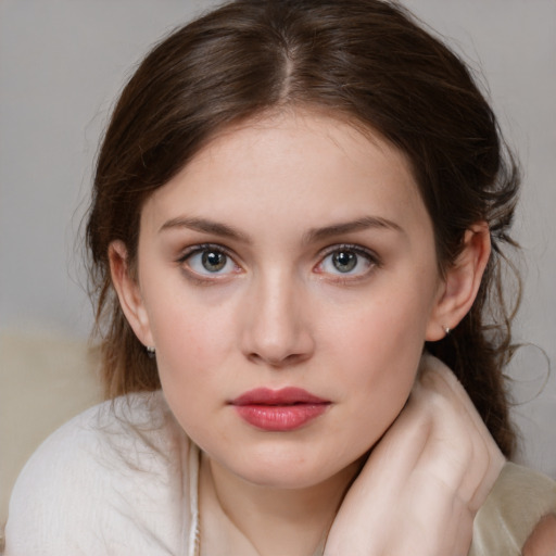 Neutral white young-adult female with medium  brown hair and blue eyes