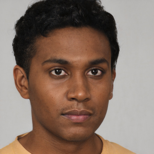 Neutral black young-adult male with short  brown hair and brown eyes