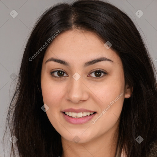 Joyful asian young-adult female with long  brown hair and brown eyes