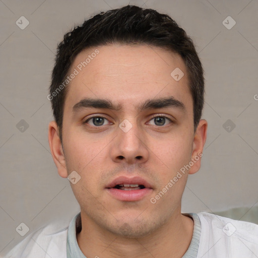 Neutral white young-adult male with short  brown hair and brown eyes