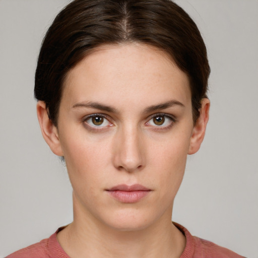 Neutral white young-adult female with short  brown hair and grey eyes