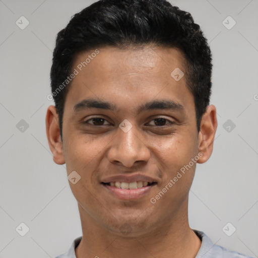 Joyful latino young-adult male with short  black hair and brown eyes