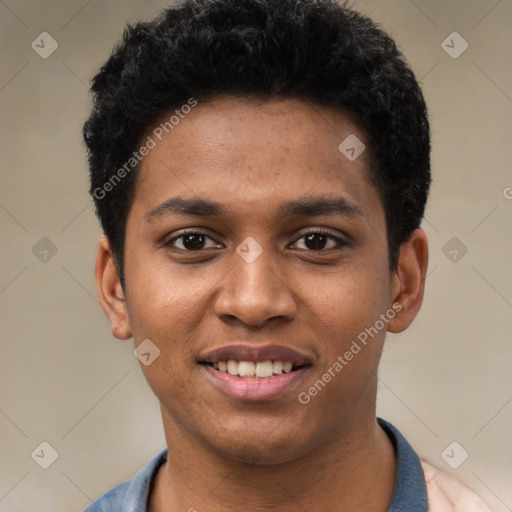 Joyful black young-adult male with short  black hair and brown eyes