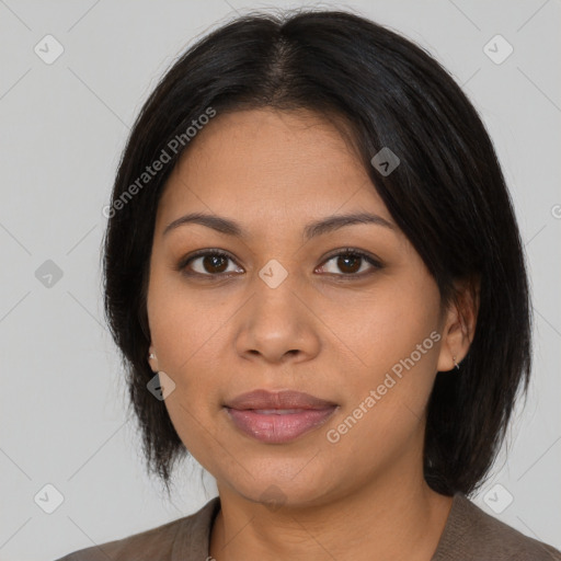 Joyful latino young-adult female with medium  brown hair and brown eyes