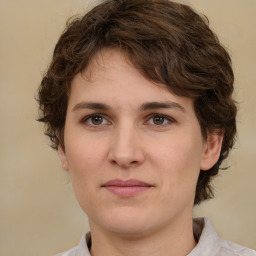 Joyful white young-adult male with medium  brown hair and brown eyes