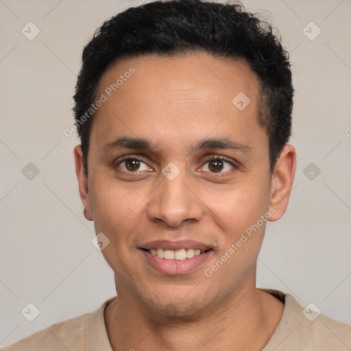 Joyful latino young-adult male with short  black hair and brown eyes