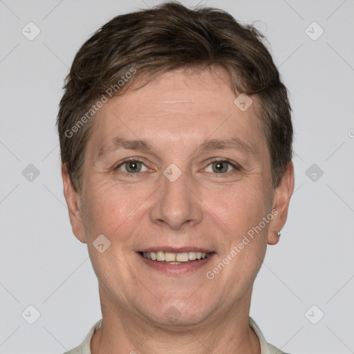 Joyful white adult male with short  brown hair and grey eyes