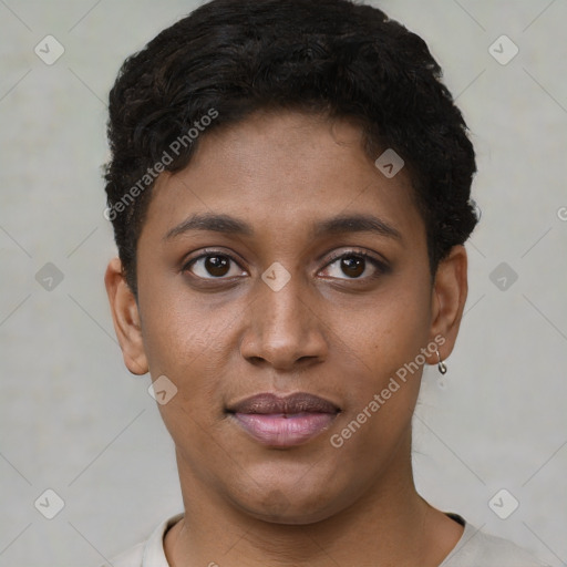 Joyful black young-adult female with short  black hair and brown eyes