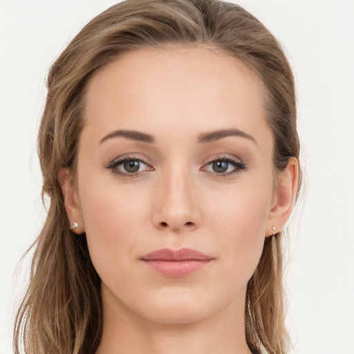 Joyful white young-adult female with long  brown hair and grey eyes