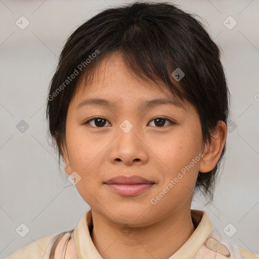 Joyful asian child female with medium  brown hair and brown eyes