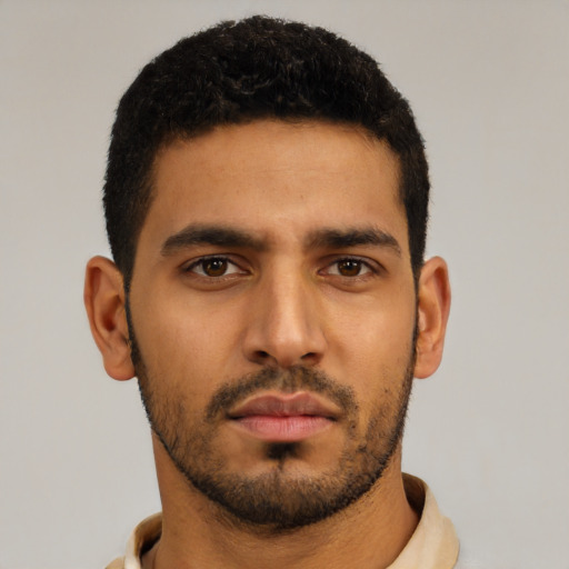 Neutral latino young-adult male with short  black hair and brown eyes