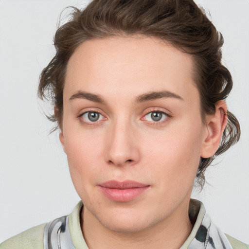 Neutral white young-adult female with medium  brown hair and green eyes