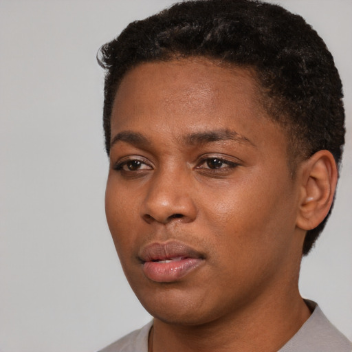 Neutral black young-adult female with short  black hair and brown eyes