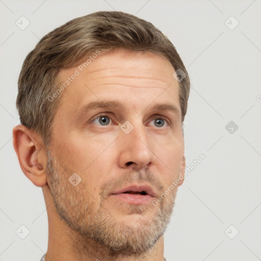 Neutral white adult male with short  brown hair and brown eyes