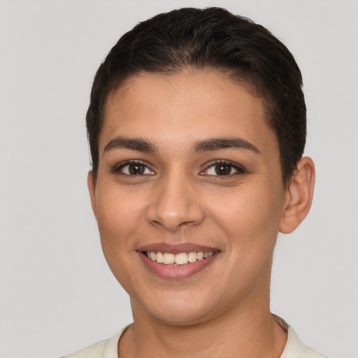 Joyful white young-adult female with short  brown hair and brown eyes