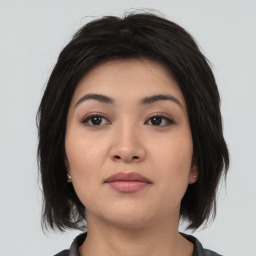 Neutral asian young-adult female with medium  black hair and brown eyes