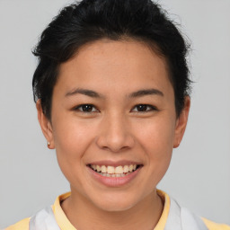 Joyful asian young-adult female with short  brown hair and brown eyes