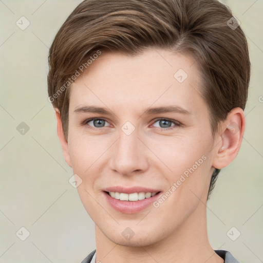 Joyful white young-adult female with short  brown hair and grey eyes