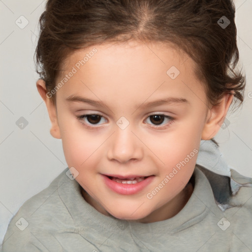 Joyful white child female with short  brown hair and brown eyes