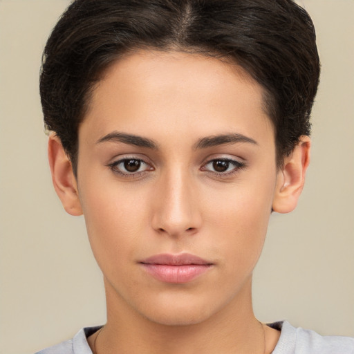 Neutral white young-adult female with short  brown hair and brown eyes