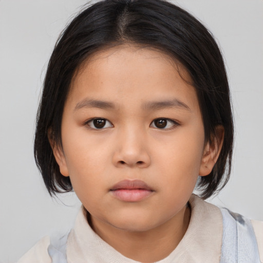 Neutral asian child female with medium  black hair and brown eyes