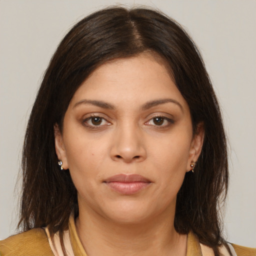 Neutral white young-adult female with medium  brown hair and brown eyes