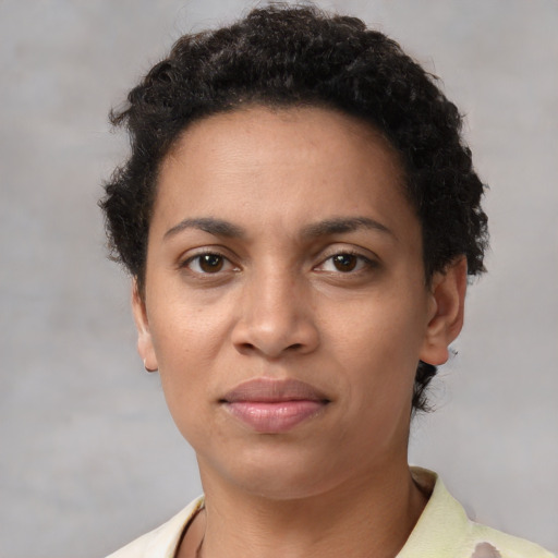 Neutral black young-adult female with short  brown hair and brown eyes